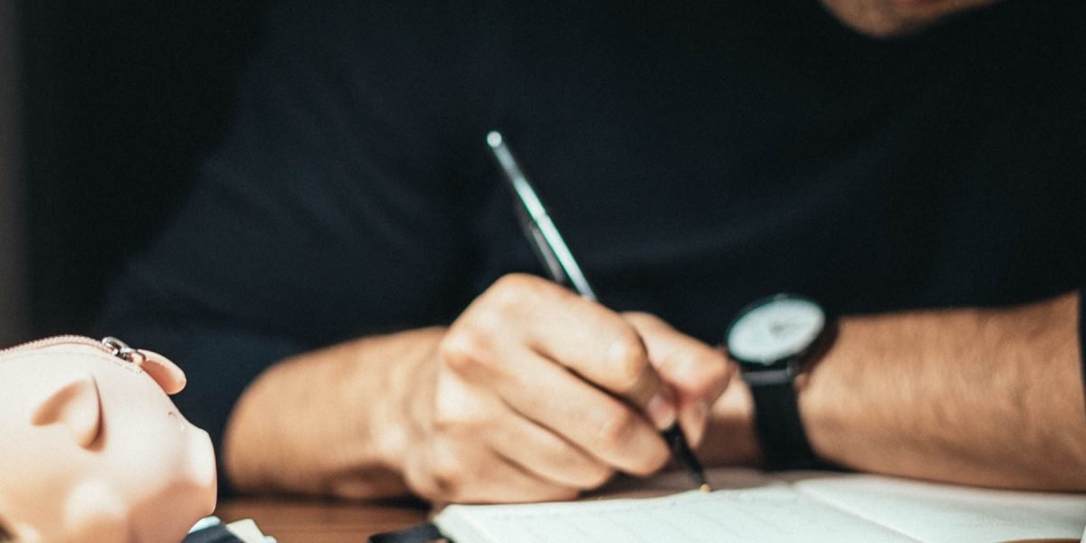 A person confidently reviewing documents, symbolizing careful planning for a significant investment.