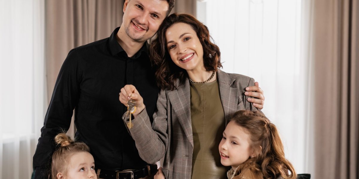 A family celebrating a new chapter, symbolizing the long-term residency and lifestyle benefits offered by the UAE Golden Visa through property investment.