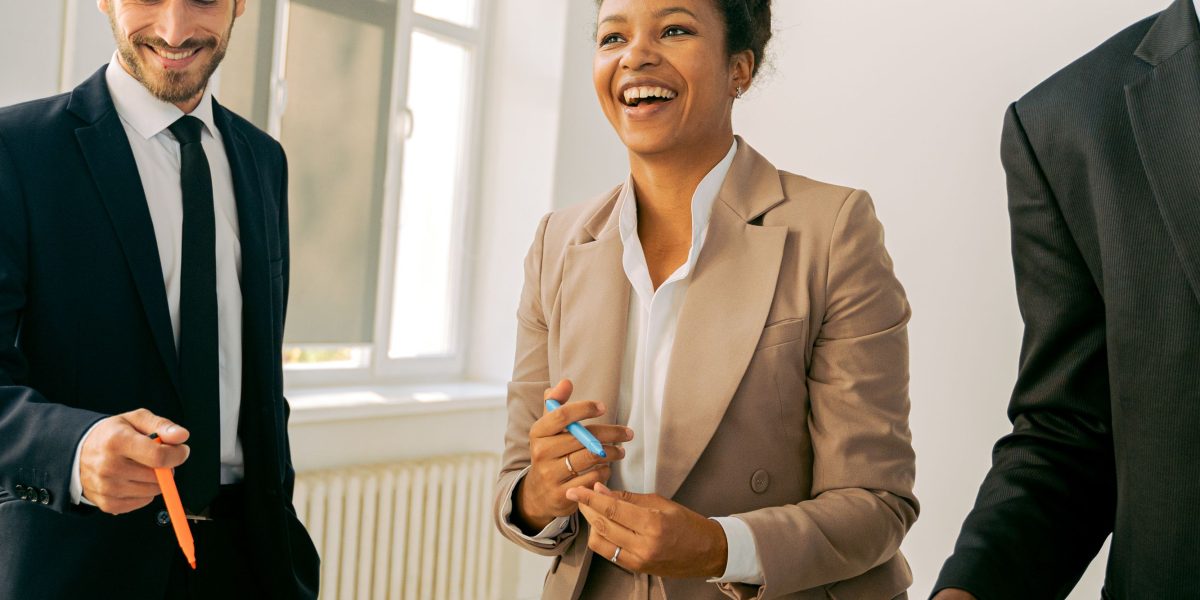 A diverse team collaborating, reflecting strategic financial planning and market analysis.