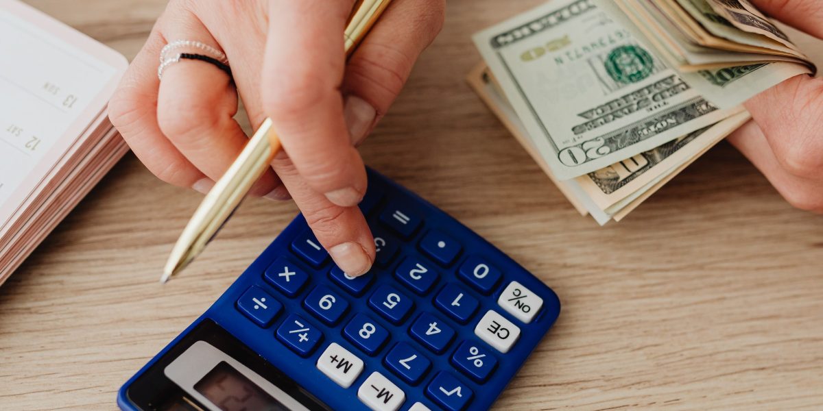 An individual thoughtfully considering financial choices, a common scenario for expats in Dubai managing cross-border transactions.